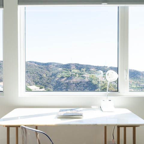Get down to work from one of the home's desk areas, if you can keep yourself from getting distracted by the view