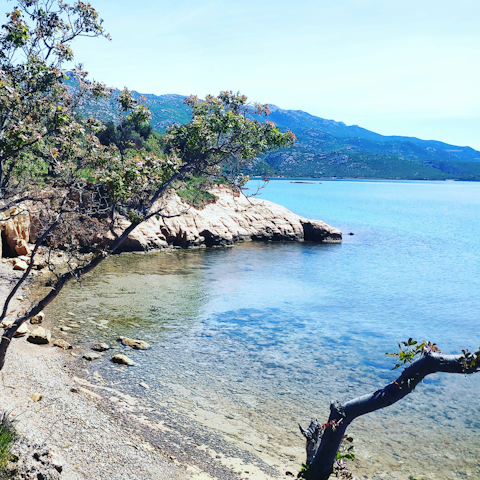 Explore the rocky coves of Punta beach, ten-minute walk away