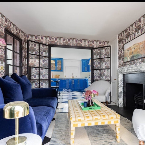 Cosy up with a book in the colourful second sitting room
