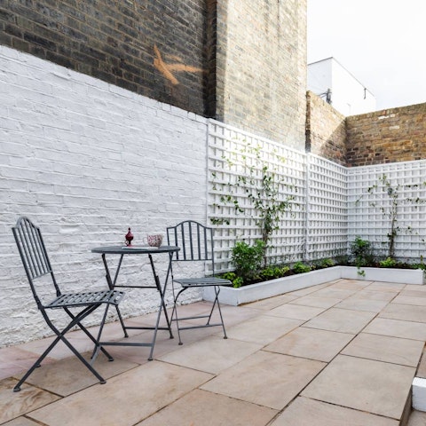 Pause on the private patio for a coffee or cocktail