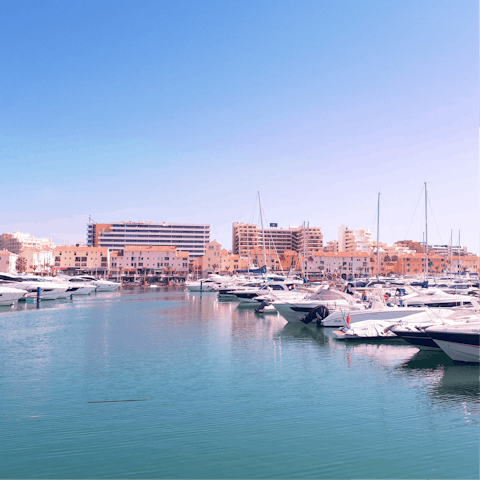 Explore the pretty town of Vilamoura, a twenty-minute drive away