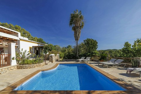 Cool off in the pool surrounded by Ibizan countryside