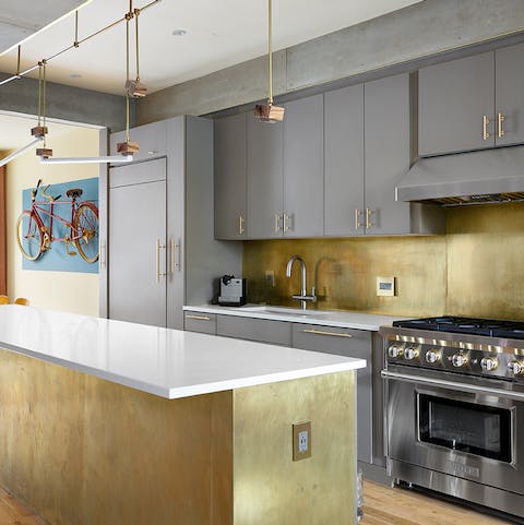 Whip up culinary masterpieces in the glamorous gold kitchen