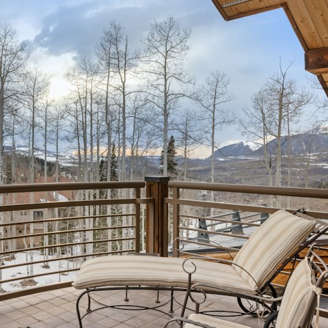 Lie back and enjoy the view of the sun over the treetops