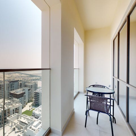 Relax with a refreshing drink on the balcony