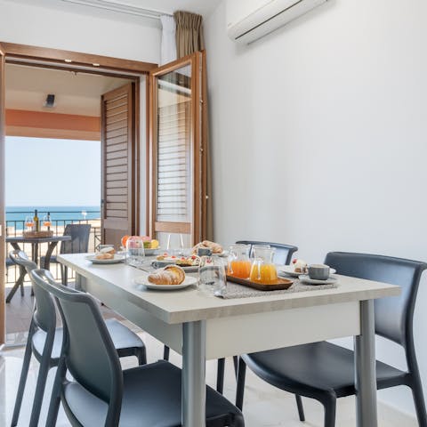 Throw open the French doors and dine with a side of sea breeze
