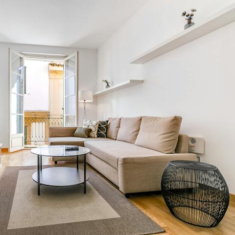 Relax on the comfy chaise sofa after sightseeing in beautiful Palma