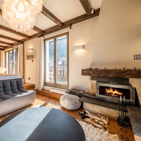 Spend cosy evenings lounging by the fire in the living room