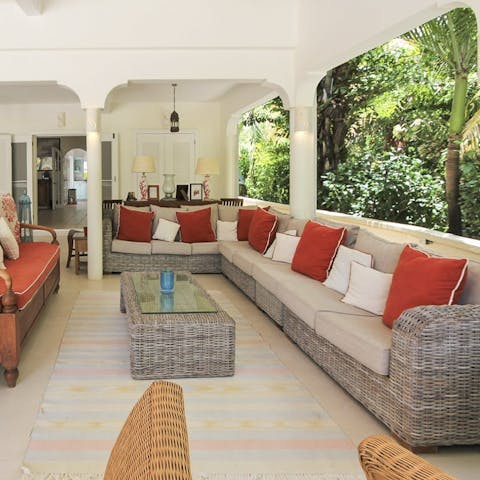 Sip refreshing cocktails on the veranda