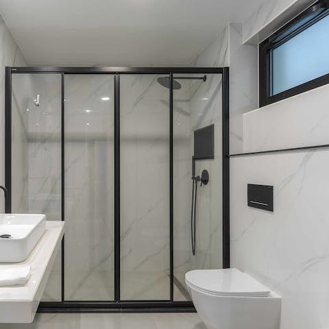 Hop into the walk-in shower and start the day right