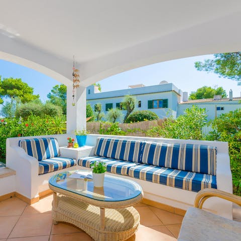 Sip a cool drink and relax on the outdoor sofa