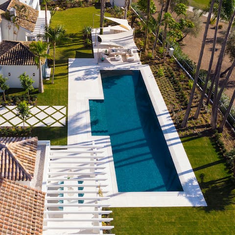 Notch up a few lengths in the villa's long swimming pool