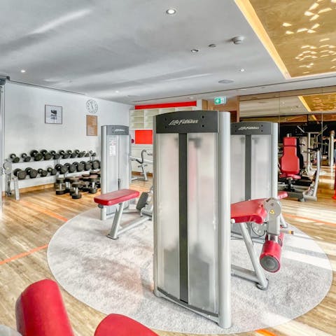 Stay on top of your fitness goals with a workout in the communal gym