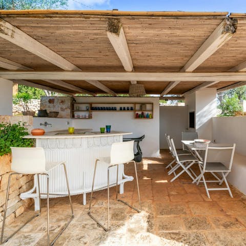 Raise a toast to your holiday at the outdoor bar