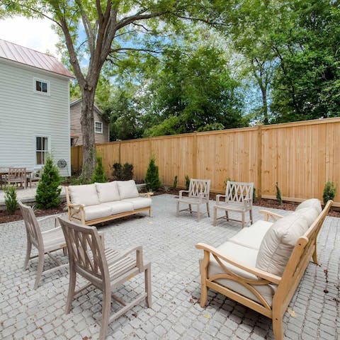 Share drinks in the landscaped garden and terrace