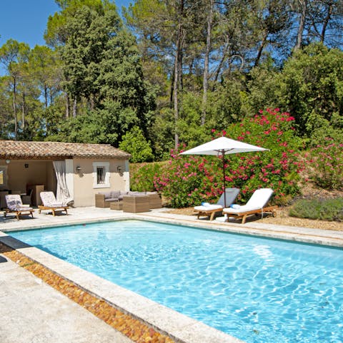 Unwind on the sun loungers surrounded by the scent of the garden