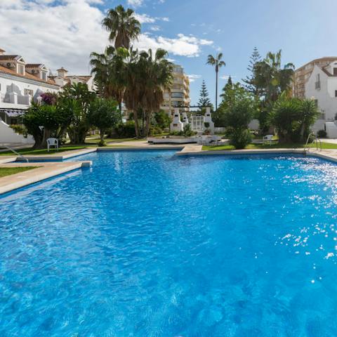 Take a refreshing swim in the communal pool