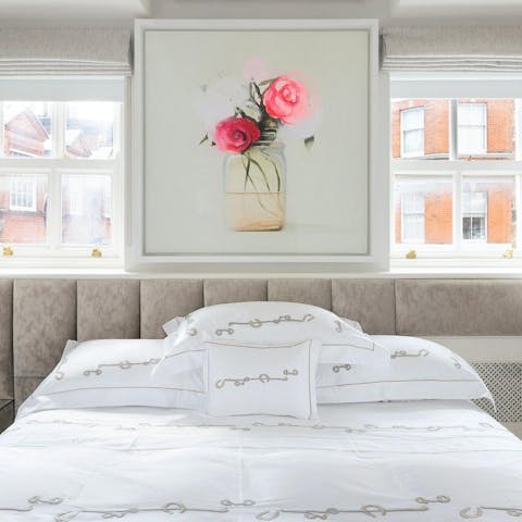 Wake up to sunshine filtering through the bedroom windows