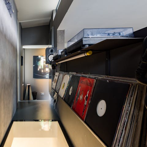 Spin some records in the DJ booth