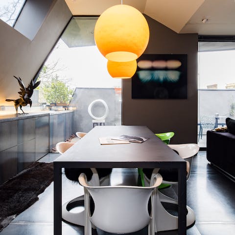 Gather together for a celebratory meal in the sleek dining area