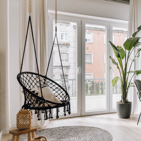 Rest weary feet on the swing after sightseeing around Lisbon