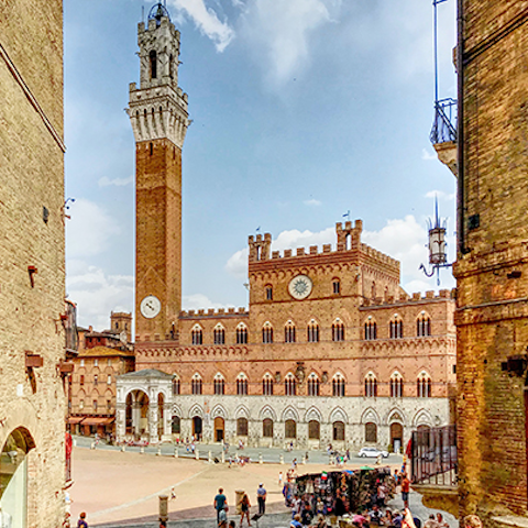 Visit the central square, Piazza del Campo, in Siena, 5km away