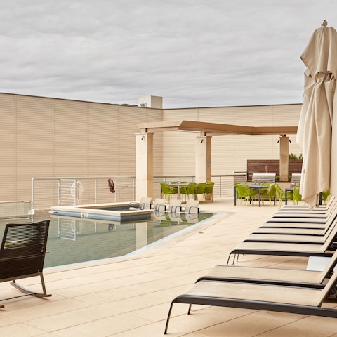 Sip cocktails on the poolside sun loungers