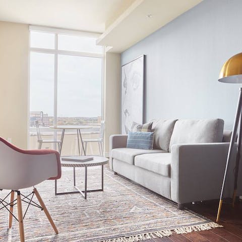 Kick back in a bright and stylish living area