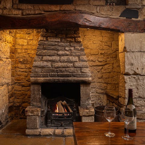 Curl up around the fire with a glass of wine