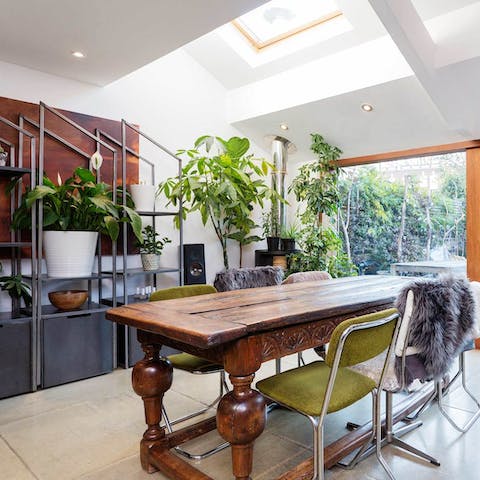 Make the most of the lovely light-filled dining room and private garden