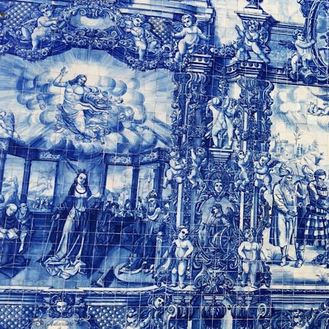 Wander round the corner to gaze at the blue and white tiles at the Chapel of Souls