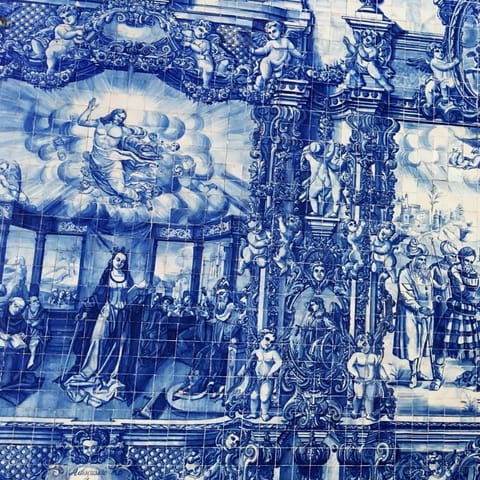 Wander round the corner to gaze at the blue and white tiles at the Chapel of Souls