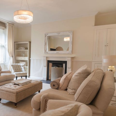 Relax by the fireplace with a cup of hot chocolate