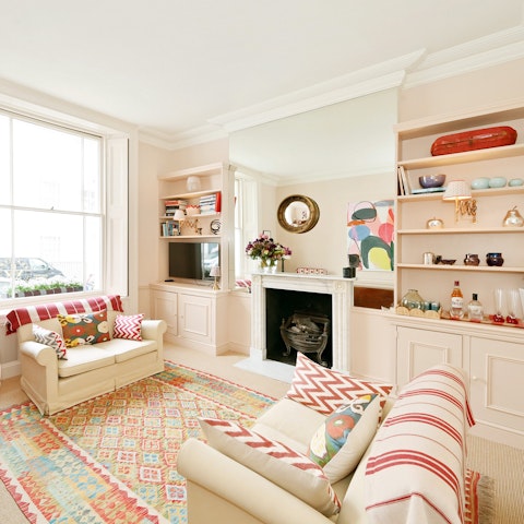 Sink into the sofa with a glass of wine