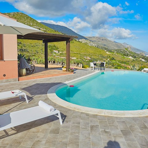 Splash around in the swimming pool or soak up the sun