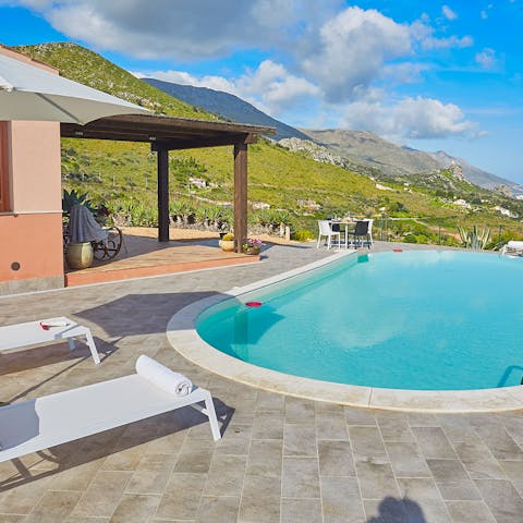 Splash around in the swimming pool or soak up the sun