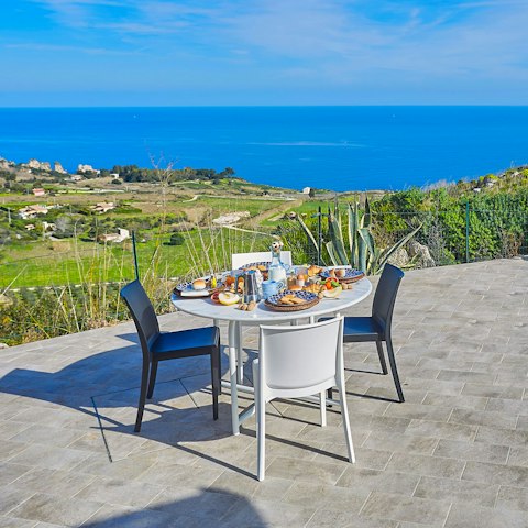 Dine alongside impressive sea views