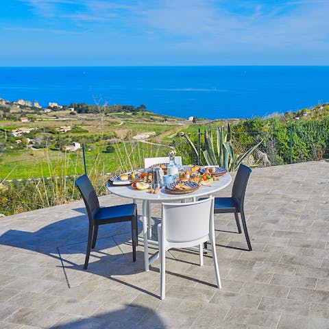 Dine alongside impressive sea views