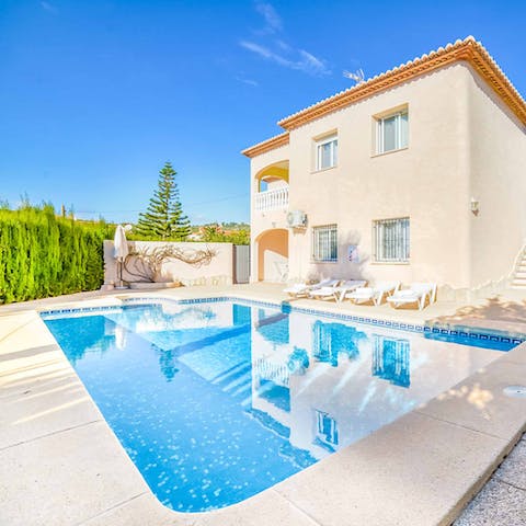 Take a dip in one of the two swimming pools in the villa's garden