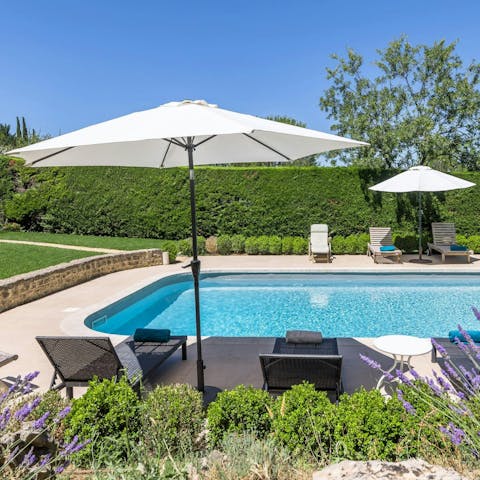 Relax on one of the many sun loungers after a refreshing dip in the pool