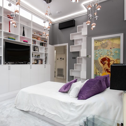 Snuggle up in bed with a movie or a game on the bedrooms' Xbox game consoles