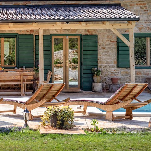 Stretch out on a lounger and soak up the hot Croatian sun