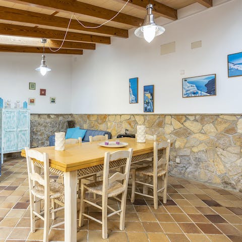 Tuck into a tasty paella around your alfresco dining set, based on a covered terrace