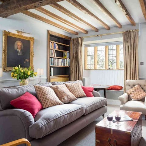 Enjoy period features like oak beams and the stone fireplace