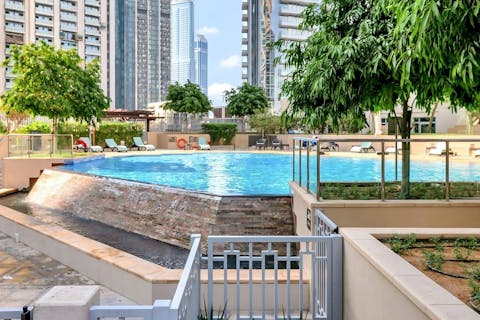 Swim in the communal pool to cool off in the Dubai heat