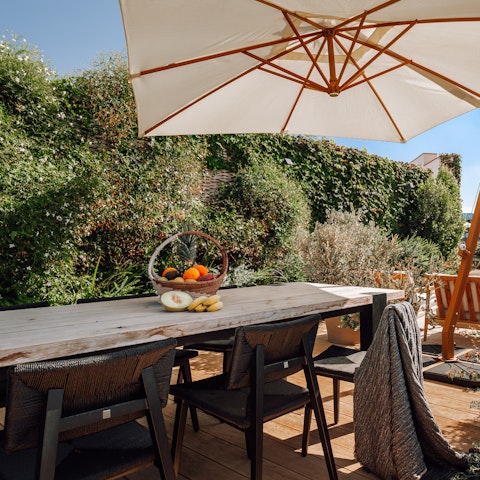 Dine on tapas out in the heat at the shared alfresco dining area