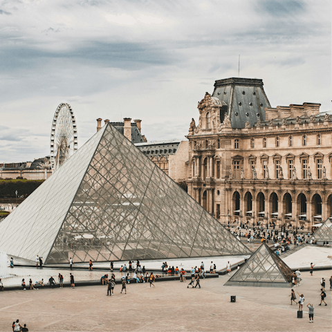 Walk fifteen minutes to the Louvre and spend the day among art
