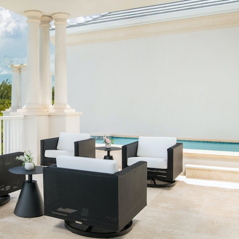 Relax on the outdoor chairs after a dip in the plunge pool