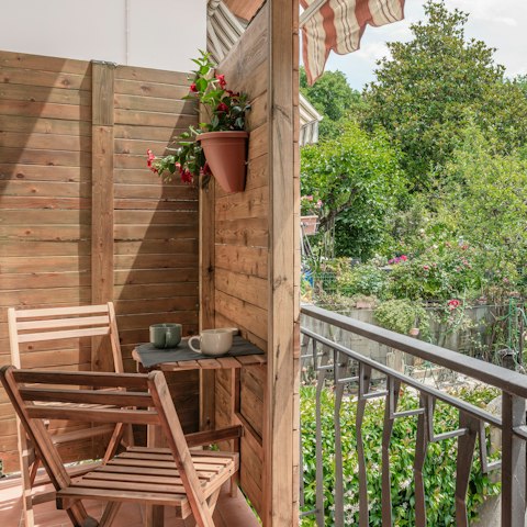 Start your mornings with coffee on the small balcony