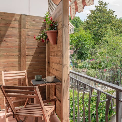 Start your mornings with coffee on the small balcony